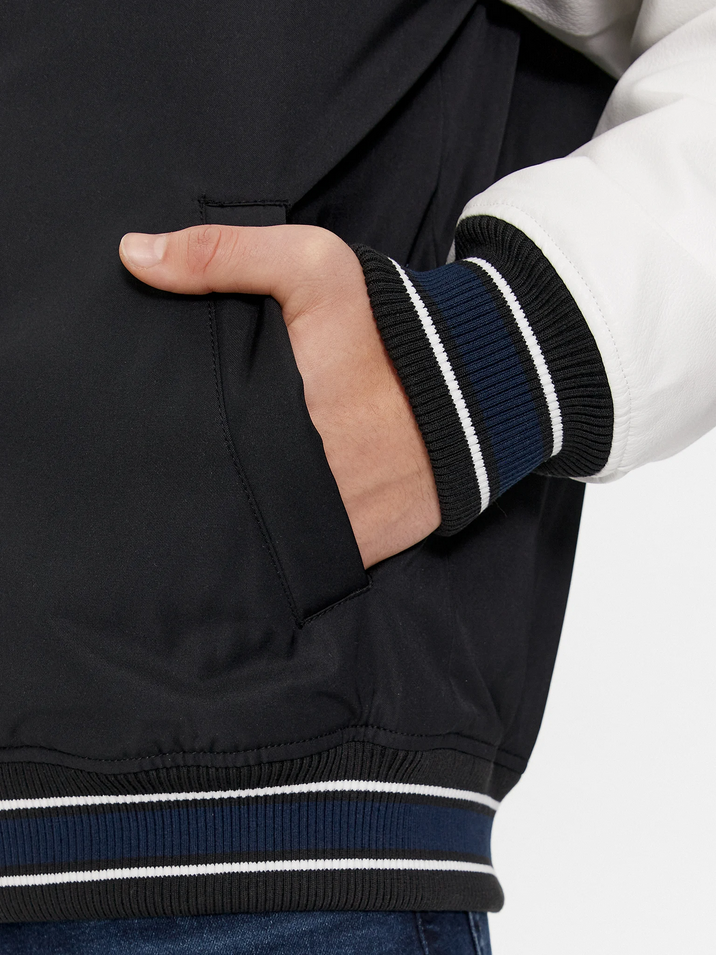 Tommy Jeans pánska bunda čierna s bielymi rukávmi